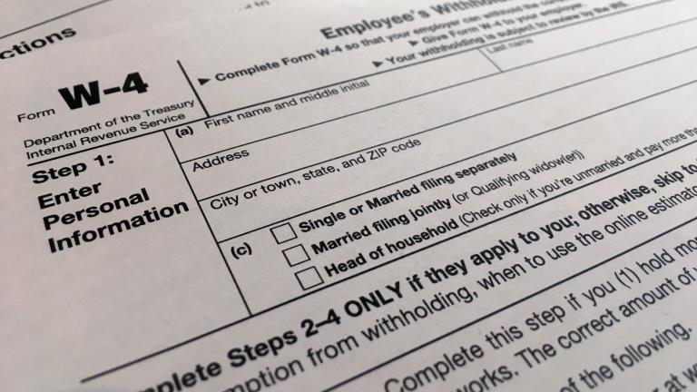 In this Feb. 5, 2020, file photo, a W-4 form is viewed in New York. (AP Photo / Patrick Sison, File) In this Feb. 5, 2020, file photo, a W-4 form is viewed in New York. (AP Photo / Patrick Sison, File)