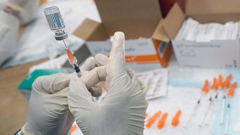 FILE - In this April 8, 2021, file photo, registered nurse fills a syringe with the Johnson & Johnson COVID-19 vaccine at a pop up vaccination site in the Staten Island borough of New York. (AP Photo / Mary Altaffer, File)