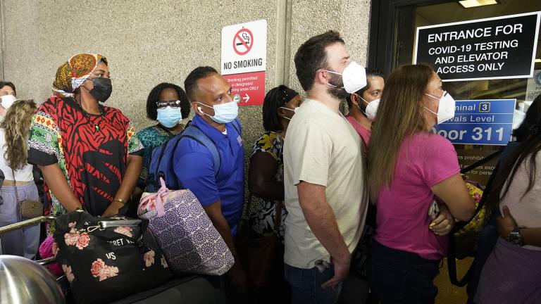 Passengers wait in a long line to get a COVID-19 test to travel overseas at Fort Lauderdale-Hollywood International Airport, Friday, Aug. 6, 2021, in Fort Lauderdale, Fla. (AP Photo / Marta Lavandier)