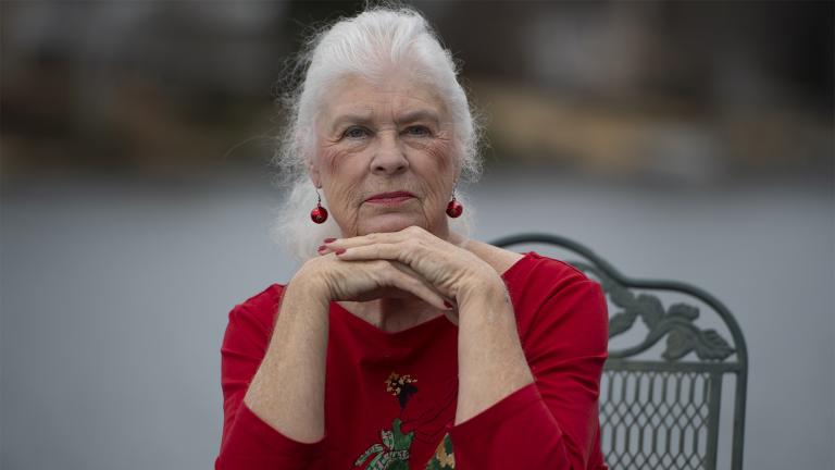 Wanda Olson poses for a photo, Friday, Dec. 17, 2021, in Villa Rica, Ga. When Olson’s son-in-law died in March after contracting COVID-19, she and her daughter had to grapple with more than just their sudden grief. They had to come up with money for a cremation. Even without a funeral, the bill came to nearly $2,000, a hefty sum that Olson initially covered. (AP Photo / Mike Stewart)