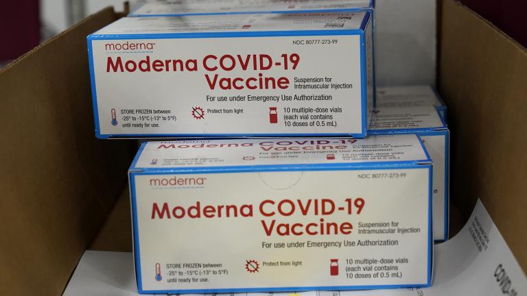 Boxes containing the Moderna COVID-19 vaccine are prepared to be shipped at the McKesson distribution center in Olive Branch, Miss., Sunday, Dec. 20, 2020. (AP Photo / Paul Sancya, Pool)