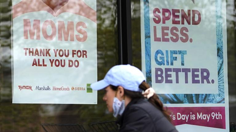 Signs about Mother’s Day are displayed at a home decor department store in Northbrook, Ill., Saturday, May 8, 2021. (AP Photo / Nam Y. Huh)