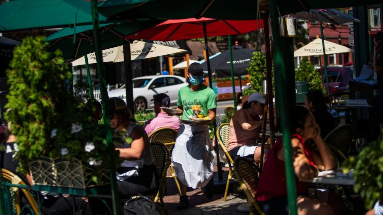 A waiter in a face mask delivers food to the tables outside of a local restaurant during lunch on Friday, Sept. 4, 2020, in Hoboken, N.J. (AP Photo / Eduardo Munoz Alvarez) A waiter in a face mask delivers food to the tables outside of a local restaurant during lunch on Friday, Sept. 4, 2020, in Hoboken, N.J. (AP Photo / Eduardo Munoz Alvarez)