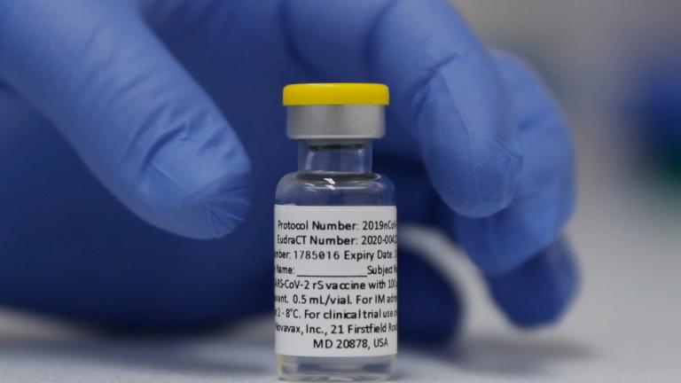 In this Wednesday, Oct. 7, 2020, file photo, a vial of the Phase 3 Novavax coronavirus vaccine is seen ready for use in the trial at St. George's University hospital in London. (AP Photo / Alastair Grant, File)