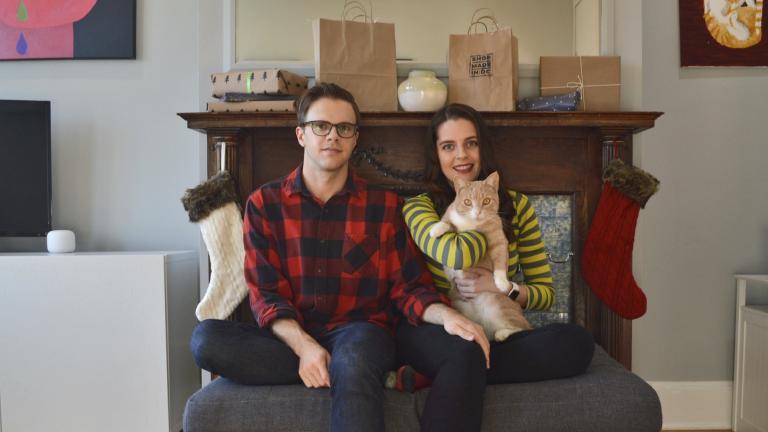 In this photo provided by Kate Hilts, Ross Hettervig, left, and Kate Hilts pose for a photo with their cat, Potato, on Nov. 14, 2020, in Washington. (Kate Hilts via AP) In this photo provided by Kate Hilts, Ross Hettervig, left, and Kate Hilts pose for a photo with their cat, Potato, on Nov. 14, 2020, in Washington. (Kate Hilts via AP)