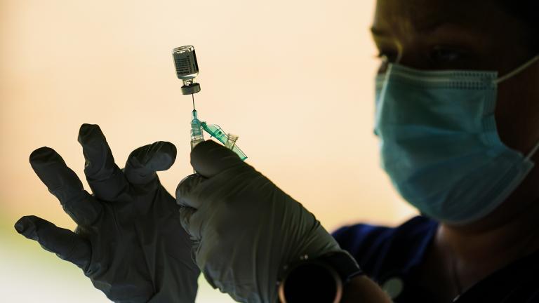 A syringe is prepared with the Pfizer COVID-19 vaccine at a clinic at the Reading Area Community College in Reading, Pa., Tuesday, Sept. 14, 2021. (AP Photo / Matt Rourke)