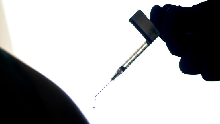 In this Dec. 15, 2020, file photo, a droplet falls from a syringe after a person was injected with the Pfizer COVID-19 vaccine at a hospital in Providence, R.I. (AP Photo / David Goldman, File)
