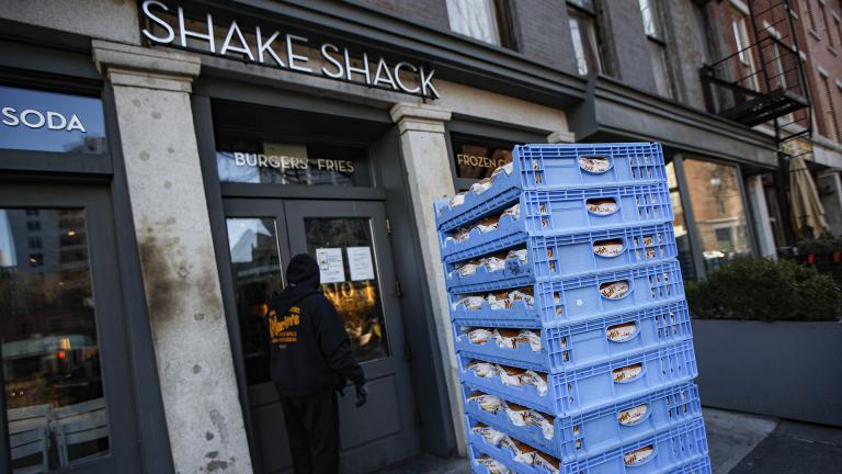 In this March 16, 2020, file photo, a bread delivery is made to a Shake Shack restaurant in the Brooklyn borough of New York. (AP Photo / John Minchillo, File)