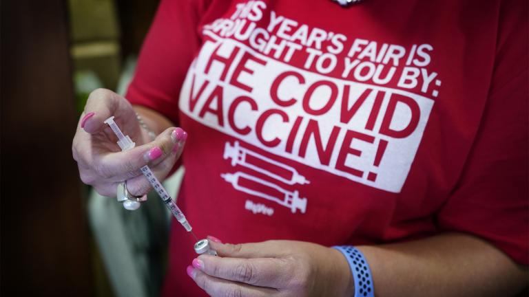 Hy Vee pharmacist Tiffany Aljets fills a syringe for a COVID-19 vaccination, Monday, Aug. 16, 2021, in Des Moines, Iowa. (AP Photo / Charlie Neibergall)