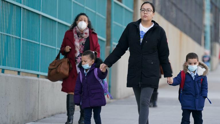 Children and their caregivers arrive for school in New York, Monday, March 7, 2022. (AP Photo / Seth Wenig, File)