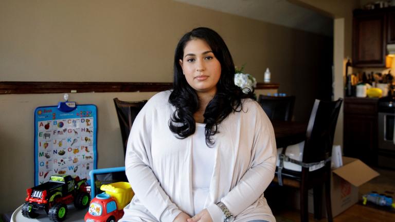 Priscilla Medina poses for a portrait in her home in Queens in New York on Wednesday, April 7, 2021. (AP Photo / Marshall Ritzel)