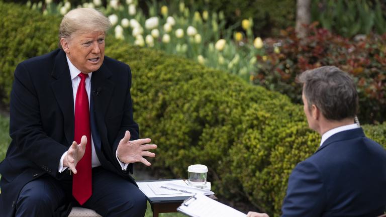 President Donald Trump talks with host Bill Hemmer during a Fox News virtual town hall with members of the coronavirus task force, in the Rose Garden at the White House, Tuesday, March 24, 2020, in Washington. (AP Photo / Evan Vucci) President Donald Trump talks with host Bill Hemmer during a Fox News virtual town hall with members of the coronavirus task force, in the Rose Garden at the White House, Tuesday, March 24, 2020, in Washington. (AP Photo / Evan Vucci)