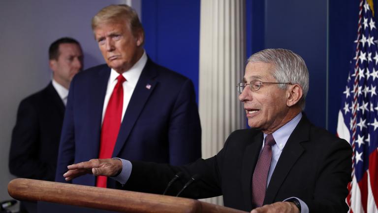 In this April 22, 2020, file photo, President Donald Trump listens as Dr. Anthony Fauci, director of the National Institute of Allergy and Infectious Diseases, speaks about the coronavirus in the James Brady Press Briefing Room of the White House in Washington. (AP Photo / Alex Brandon, File)