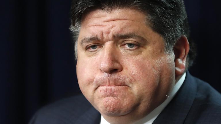 In this March 19, 2020 photo, Illinois Gov. J.B. Pritzker listens to a question during a news conference in Chicago. (AP Photo / Charles Rex Arbogast)