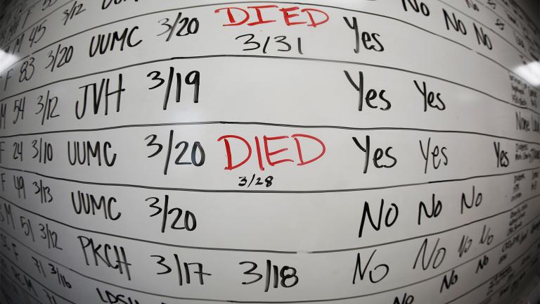 This May 13, 2020, file photo taken with a fisheye lens shows a list of the confirmed COVID-19 cases in Salt Lake County early in the coronavirus pandemic at the Salt Lake County Health Department, in Salt Lake City.  (AP Photo / Rick Bowmer, File)