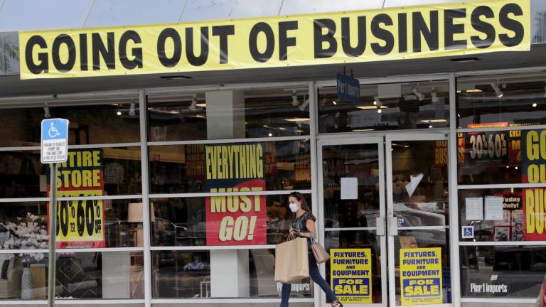 In this Aug. 6, 2020, file photo, a customer leaves a Pier 1 retail store, which is going out of business, during the coronavirus pandemic in Coral Gables, Fla. The Labor Department reported unemployment numbers Thursday, Sept. 3. (AP Photo/Lynne Sladky, File)