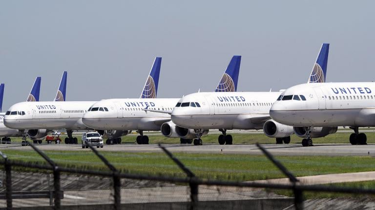 In this March 25, 2020 file photo, United Airlines planes are parked at George Bush Intercontinental Airport in Houston. (AP Photo / David J. Phillip, File) In this March 25, 2020 file photo, United Airlines planes are parked at George Bush Intercontinental Airport in Houston. (AP Photo / David J. Phillip, File)