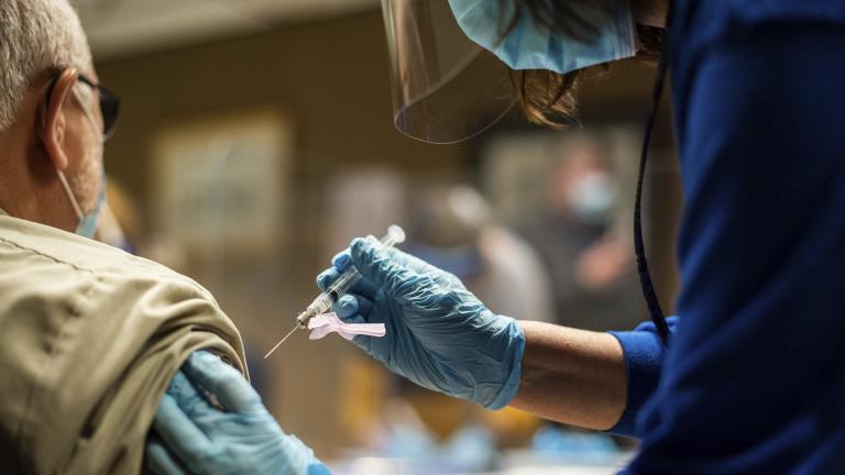 In this Feb. 2, 2021 file photo, Tyson Foods team members receive COVID-19 vaccines from health officials at the Wilkesboro, N.C. facility. (Melissa Melvin / AP Images for Tyson Foods File) In this Feb. 2, 2021 file photo, Tyson Foods team members receive COVID-19 vaccines from health officials at the Wilkesboro, N.C. facility. (Melissa Melvin / AP Images for Tyson Foods File)