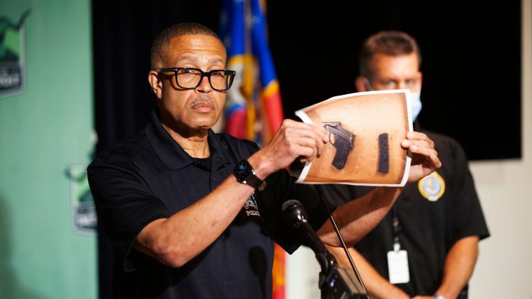 In this July 10, 2020 file photo, Detroit Police Chief James Craig shows a photograph of the handgun used by a man who shot at police officers at close range while they were arresting his friend. (John T. Greilick / Detroit News via AP, File)