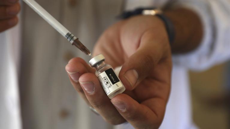 In this Sunday, July 11, 2021 file photo, a doctor fills a syringe with the Johnson & Johnson COVID-19 vaccine at a vaccination center in Kabul, Afghanistan. (AP Photo / Rahmat Gul, file)