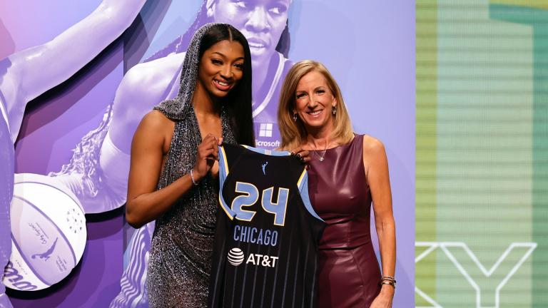 LSU’s Angel Reese, left, poses for a photo with WNBA commissioner Cathy Engelbert after being selected seventh overall by the Chicago Sky during the first round of the WNBA basketball draft on Monday, April 15, 2024, in New York. (AP Photo/Adam Hunger)
