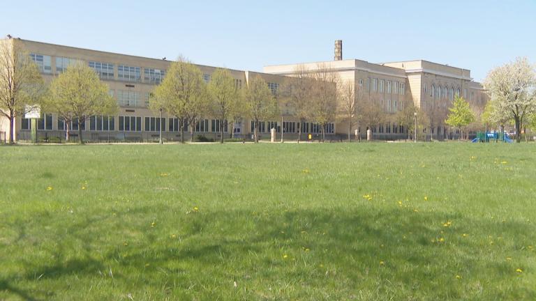 More than 100 asylum-seekers have moved into the former Wadsworth Elementary School in the Woodlawn neighborhood. (WTTW News)