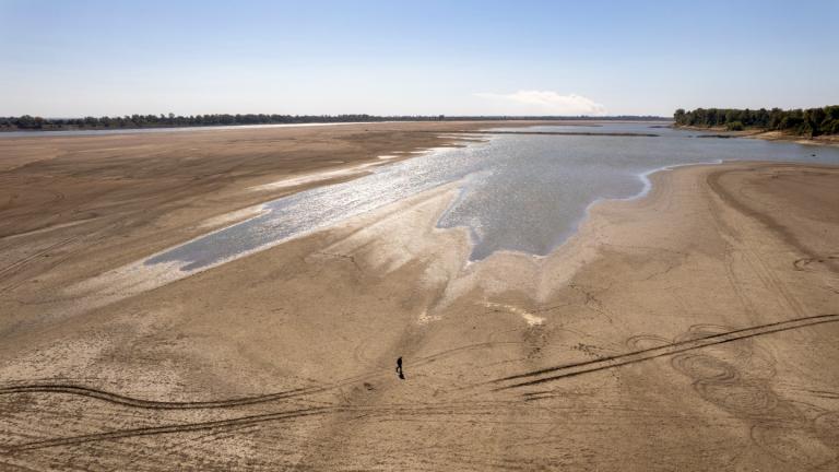 James Isaacks walks where the normally wide Mississippi River would flow, Oct. 20, 2022, near Portageville, Mo. (AP Photo / Jeff Roberson)