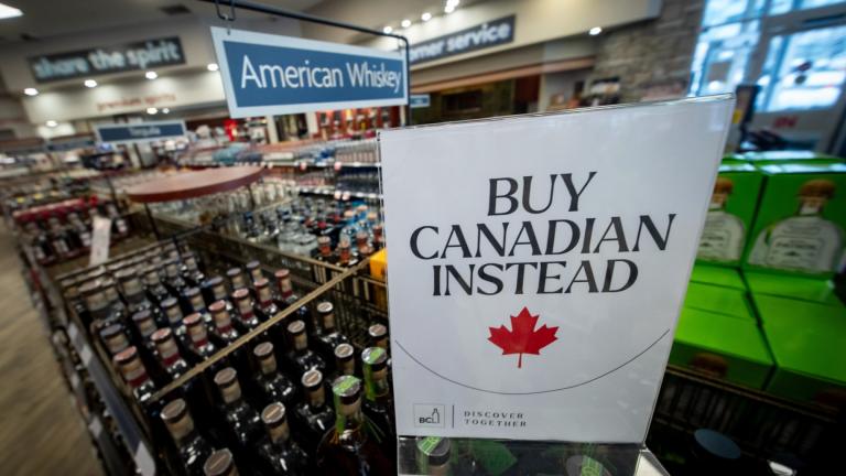  A sign is placed in front of the American whiskey section at a B.C. liquor store after top selling American made products have been removed from shelves in Vancouver, B.C., Feb. 2, 2025. (Ethan Cairns / The Canadian Press via AP, file)