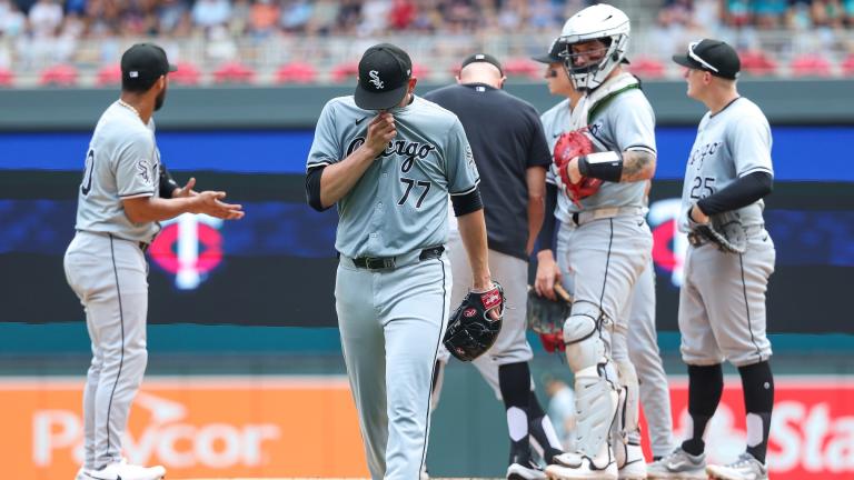 Chicago White Sox starting pitcher Chris Flexen, center, reacts as he comes out of a baseball game during the second inning against the Minnesota Twins, Sunday, Aug. 4, 2024, in Minneapolis. (AP Photo / Matt Krohn)