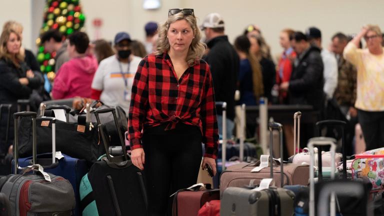 Ashlyn Harmon of New Orleans searches for her Southwest Airlines bags amongst hundreds of others at Midway International Airport as Southwest continues to cancel thousands of flights across the country Wednesday, Dec. 28, 2022, in Chicago. Harmon said her family’s initial Southwest flight was cancelled on Christmas so they rebooked on American Airlines, although Southwest still shipped their bags to Midway. “We rebooked ourselves,” she said. “I figure we can deal with refunds and all of that when we get bac
