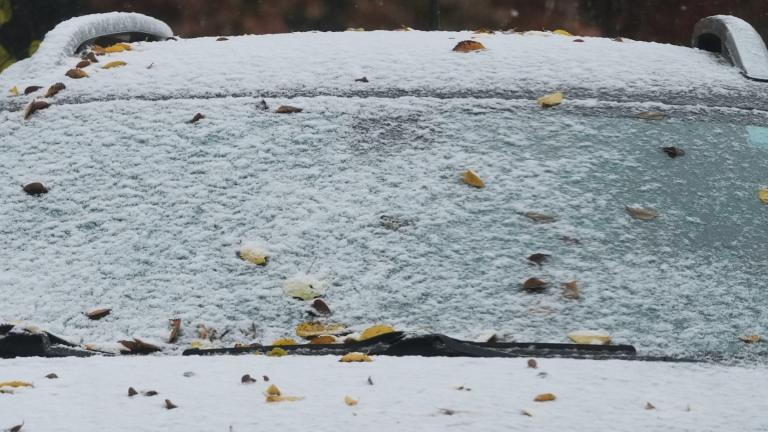 A car is covered with snow during a cold day in Evanston, Ill., Sunday, Nov. 9, 2025. (AP Photo / Nam Y. Huh)