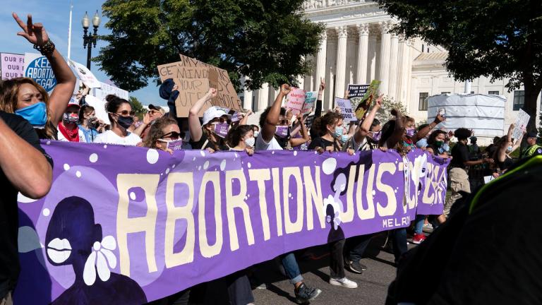 Thousands of demonstrators march outside the U.S. Supreme Court during the Women’s March in Washington, Saturday, Oct. 2, 2021. (AP Photo / Jose Luis Magana)