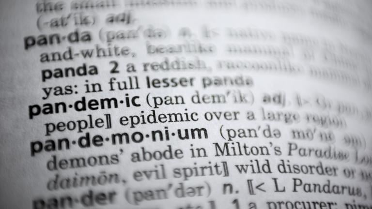 In this Saturday, Nov. 21, 2020, photo the word pandemic is displayed in a dictionary in Washington. Merriam-Webster on Monday announced “pandemic” as its 2020 word of the year. (AP Photo / Jenny Kane)