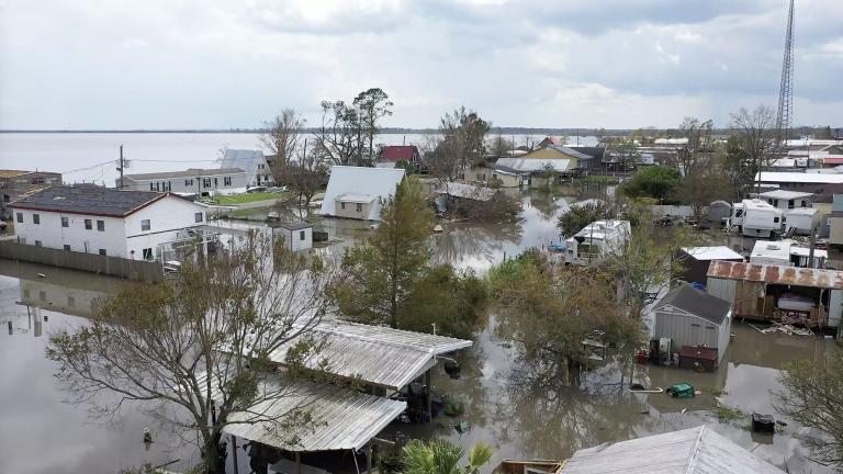  A view near the home of commercial crabber Roy Comardelle, who built a levee around his property, is shown at Des Allemands, La., Tuesday, Aug. 31, 2021. (AP Photo / Steve Helber, File)