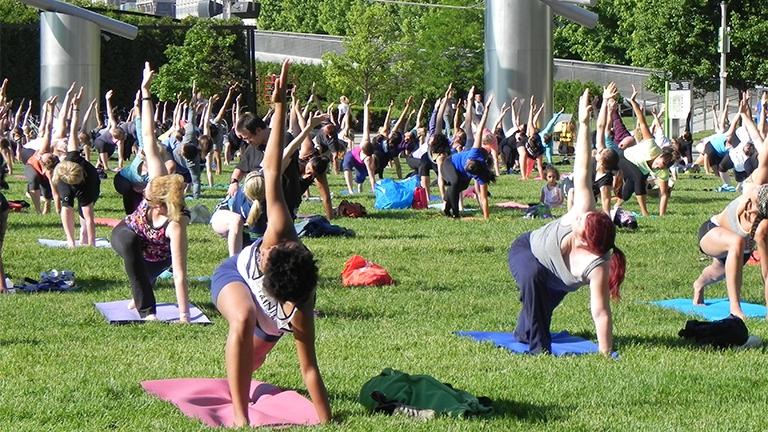 Free summer workout classes, including yoga, return to Millennium Park in June. (Courtesy of the city of Chicago Department of Cultural Affairs and Special Events)