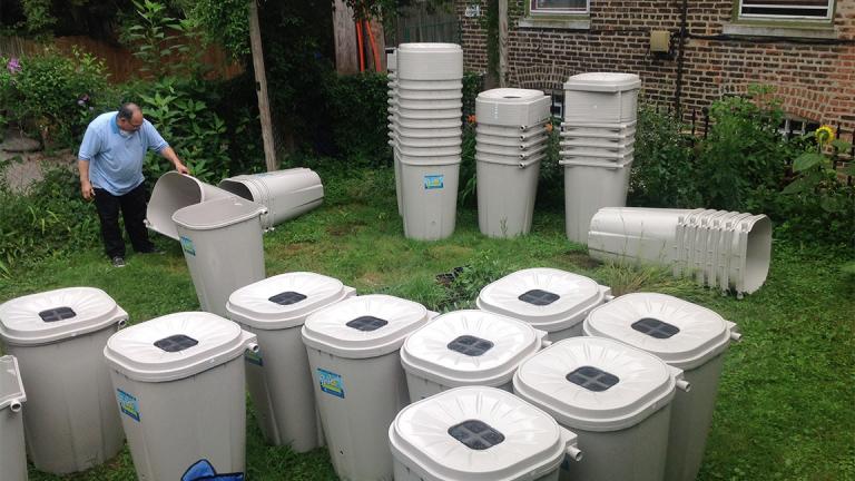 The Metropolitan Water Reclamation District provided 500 rain barrels for the environmental organization Faith in Place to distribute. (Ramont Bell)