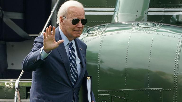 President Joe Biden waves as he steps from Marine One upon his return from Delaware to the White House in Washington, August 14, 2023. (Kevin Lamarque / Reuters via CNN)