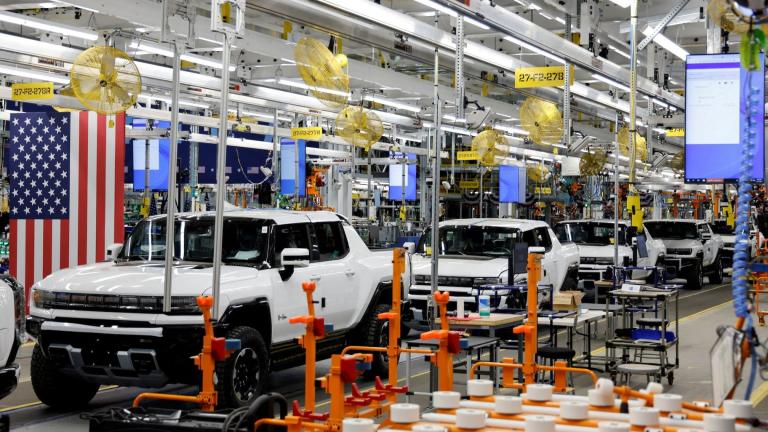 Hummer EV are seen on the production line as President Biden tours the GM assembly plant, in Detroit, Michigan, in November, 2021. (Jonathan Ernst / Reuters / FILE)