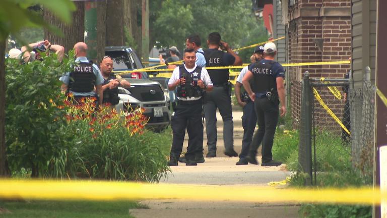 Chicago police officers are on the scene of a shooting in the 4600 block of North Springfield Avenue on July 20, 2026. (WTTW News)