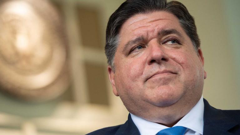 Illinois Gov. J.B. Pritzker, a Democrat, repealed a law criminalizing HIV. (Saul Loeb / AFP / Getty Images)