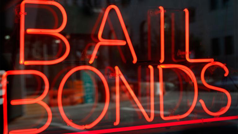 FILE - This file photo shows a sign advertising a bail bonds business in the Brooklyn borough of New York. (Kathy Willens / AP)