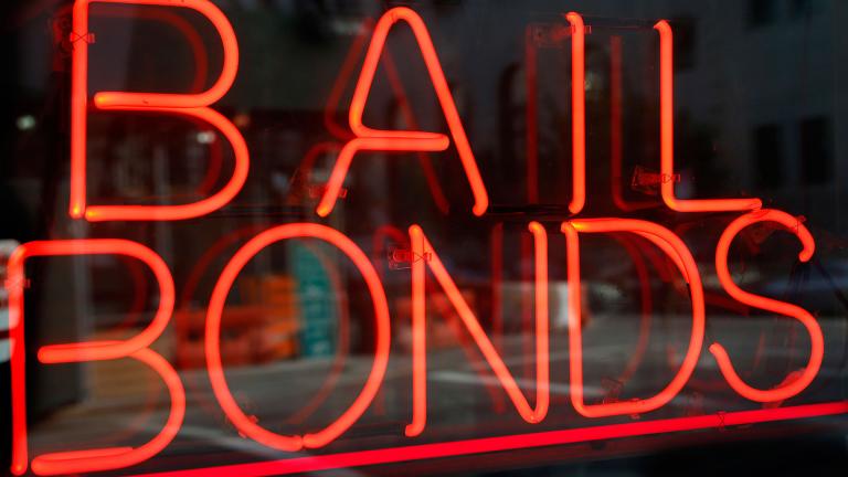 This file photo shows a sign advertising a bail bonds business in the Brooklyn borough of New York. (Kathy Willens / AP)