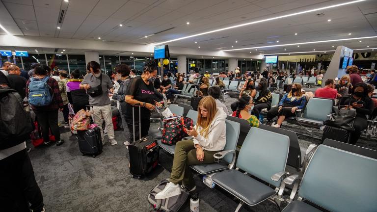 Travelers wait for their flight at Los Angeles International Airport. According to the flight tracking website, FlightAware, there have been 200 flights canceled so far on Aug. 8. On Aug. 7, 950 flights were canceled. (Michael Ho Wai Lee / SOPA Images / Sipa)(Michael Ho Wai Lee / SOPA Images / Sipa)