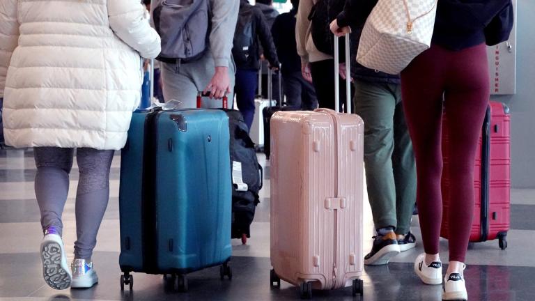 Key U.S. airlines have issued travel waivers ahead of what's forecast to be a brutal “bomb cyclone” of wintry weather in the Midwest and other regions. (Scott Olson / Getty Images North America / Getty Image)