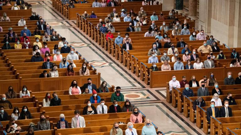 People attend Easter Sunday mass while adhering to social distancing guidelines at the Basilica of the National Shrine of the Immaculate Conception in Washington, D.C., on April 4. (Saul Loeb / AFP / Getty Images)