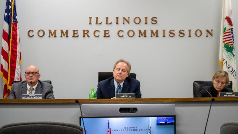 Illinois Commerce Commission member Michael Carrigan, Chair Doug Scott and member Ann McCabe are pictured at a commission meeting in Springfield earlier this month. (Jerry Nowicki / Capitol News Illinois)