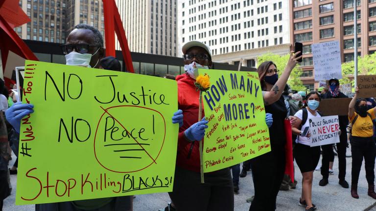 James Norwood, 53, of the suburb of South Holland, came to the Saturday, May 30, 2020 protest with his daughter Hannah. (Evan Garcia / WTTW News)