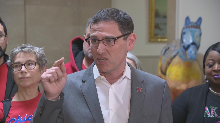 CTU President Jesse Sharkey outlines his union's contract demands in a press conference Tuesday inside City Hall. (Chicago Tonight)