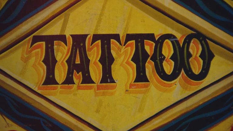A sign spotted at the Field Museum’s new “Tattoo” exhibition. (Chicago Tonight)