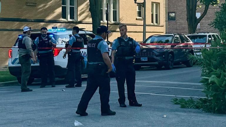 Chicago police officers responded to a fatal shooting in the 3100 block of West Carmen Avenue on May 27, 2024. (Patty Wetli / WTTW News)